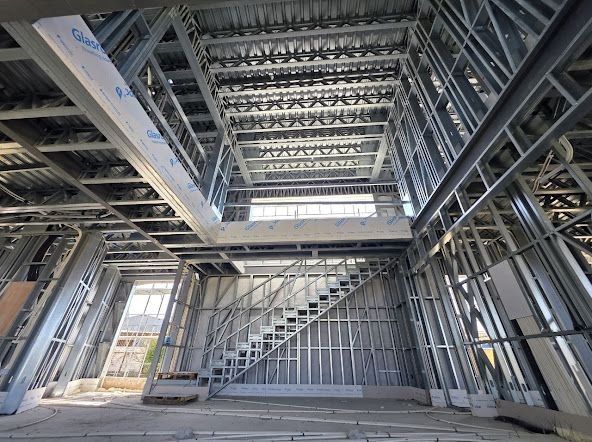 Inside a light steel frame with a staircase frame